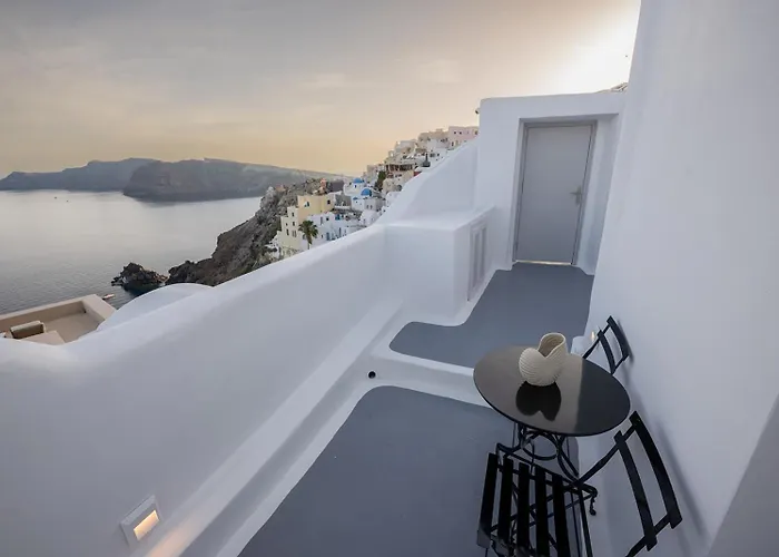 Three Domes Oia - An Iconic Collection